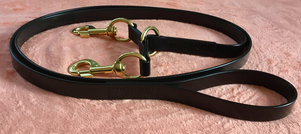 Black Biothane double clip lead with brass clips flat lay — SS Saddlery