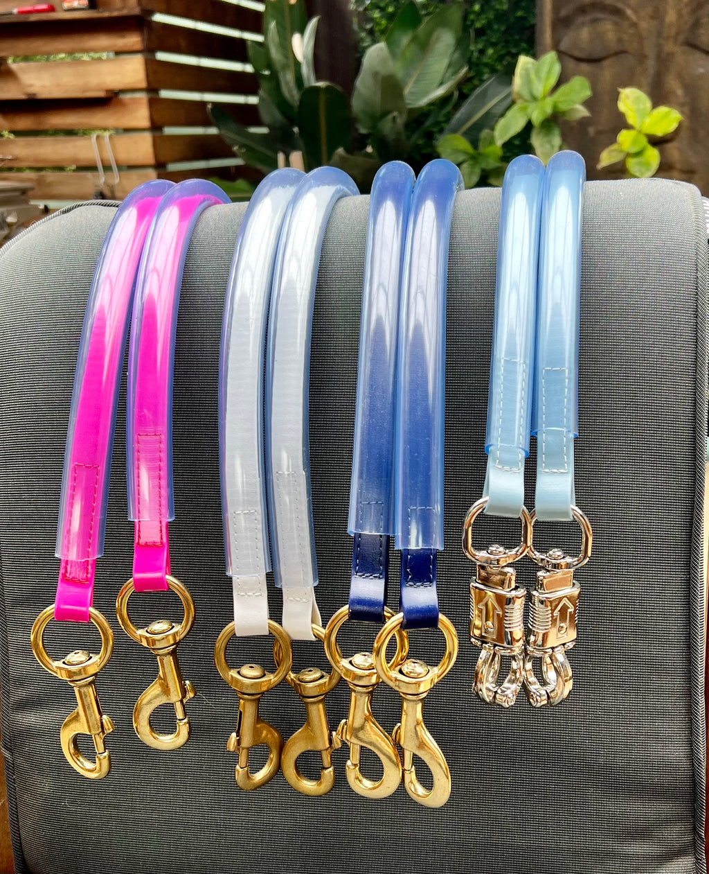 SS Saddlery Biothane race day tie-ups in assorted colours with brass clips and clear tubing flat lay