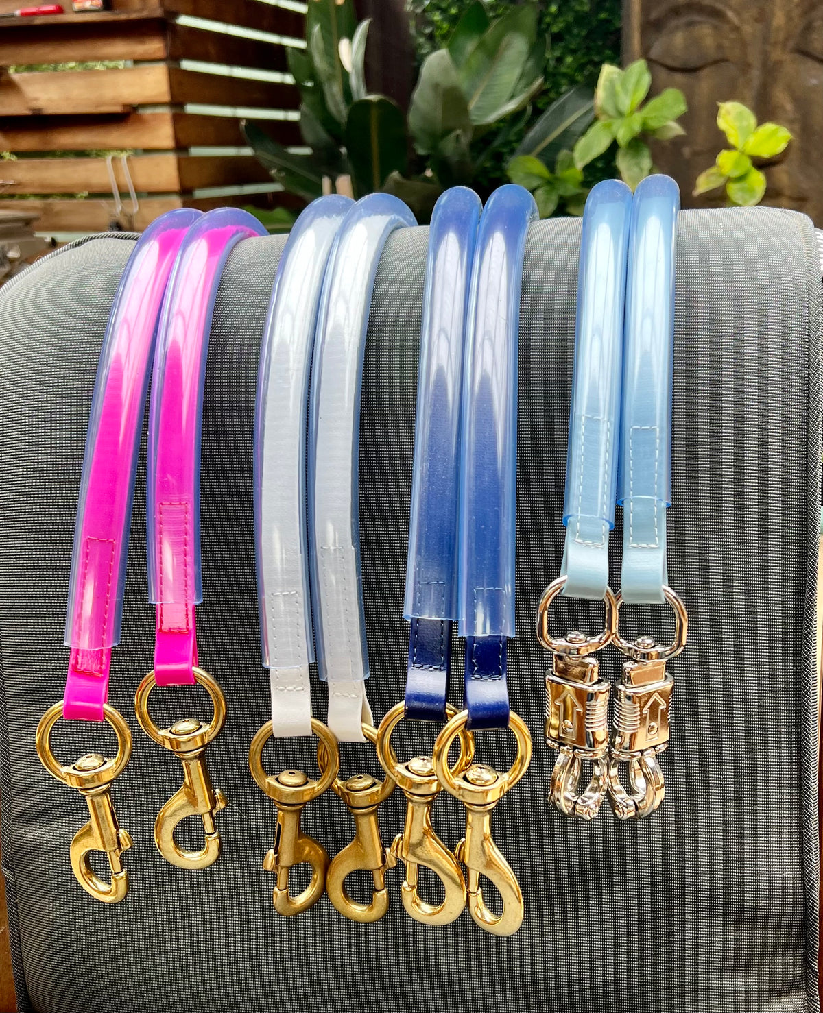 SS Saddlery Biothane race day tie-ups in assorted colours with brass clips and clear tubing flat lay